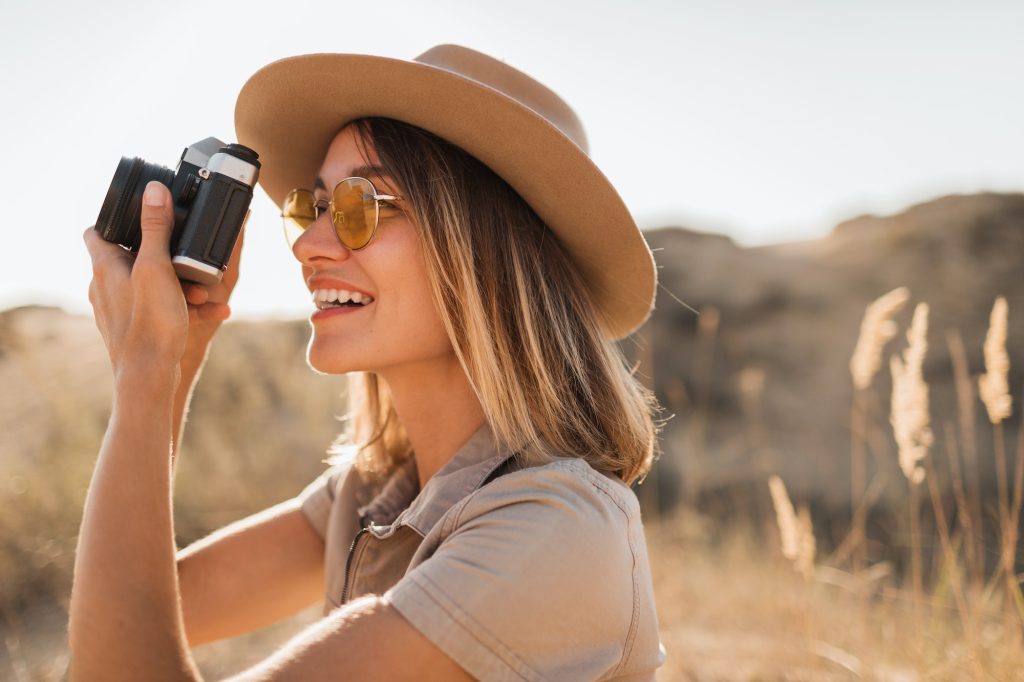 woman in desert walking on safari